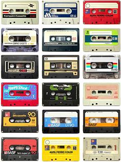 an assortment of cassette tapes are arranged in rows