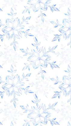 a blue and white snowflake pattern on a white background with watercolor effect