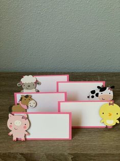 three card holders with farm animals on them