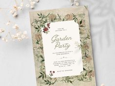 a garden party card with flowers on it