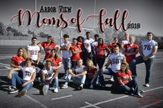 a group of people posing for a photo in front of a sign that says, aaron vieh monsof fall