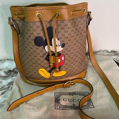 Gucci Gg Disney X Mickey Mouse Bucket Leather Tan Brown Italy Bag Mini Logo In Very Good Conditition Brown, Print Made In Italy Comes With Dust Bag Daily Use Gucci Bucket Bag, Gucci Brown Bucket Bag, Gucci Leather Bags For Gift, Gucci Brown Bag Perfect For Gift, Brown Gucci Bag As Gift, Mini Logo, Mini Logos, Tan Brown, Print Making