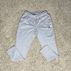 Womens Gray Adidas Sweatpants Size: Small Color: Gray Adidas Sweatpants With Pockets, Adidas Casual Loungewear Pants, Casual Adidas Stretch Pants, Adidas Cotton Pants With Pockets, Adidas Loungewear Bottoms With Elastic Waistband, Adidas Bottoms With Elastic Waistband For Loungewear, Adidas Cotton Long Pants, Adidas Loungewear Pants With Pockets, Adidas Long Pants For Loungewear