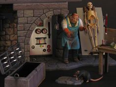 there is a fake skeleton in front of a stove with a skeleton on the counter