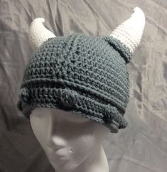 This Viking style helmet with horns hat is made of acrylic yarn that is machine washable and is made to be fashionable and functional in the cold weather and can be fun for a party or Halloween.  This Viking helmet hat can be made for children or adults in the colors of your choice.  Contact me with your special-order request.  This item is made as ordered and may take up to two weeks for a finished product. Handmade with love in my clean, smoke-free home and comes wrapped in tissue. Note: color might be different when displayed on your computer screen. Feel free to message me and I will give you an approximate time for shipping. care: - hand wash cold - use mild soap - do not tumble dry; lay flat to air dry Custom color orders:  feel free to message me with your requirements and I will gi Viking Hat Free Crochet Pattern, Crochet Viking Hat With Beard Free Pattern, Paper Mache Viking Helmet, Viking Hat Crochet Pattern, Crochet Viking Helmet With Beard, Helmet Hat, Viking Helmet, Viking Style, Costume Hats