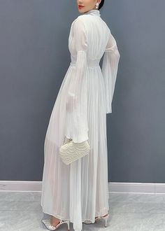 Elegant White V Neck Solid Chiffon Long Dresses FallFabric: ChiffonSize & Fit: Fit: This garment fits true to size.Length: Size L measures 47.97"from shoulder to hemBust: Great for any cup size. Waist: Loose Fit. Comfortable room throughout midsection.Hip: Loose Fit - room for hips. Hand Wash Cold. White Long Sleeve Chiffon Dress For Summer, Long Sleeve Chiffon Dress For Casual Occasions, Long Sleeve Chiffon Dress For Casual Wear, Long Sleeve Pleated Chiffon Party Dress, Pleated Long Sleeve Chiffon Party Dress, Pleated Long-sleeve Chiffon Party Dress, Flowy Chiffon Dress With Sheer Sleeves, Spring Chiffon Dress With Sheer Long Sleeves, Chic Long Sleeve Chiffon Wedding Dress