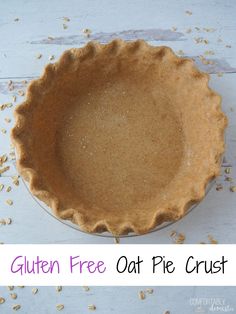 an uncooked pie crust on a white table with the words gluten free oat pie crust