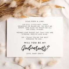 a card with the words will you be my godparents? written on it