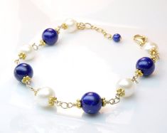 Natural Lapis Lazuli Bracelet, Real Pearls, Gold Filled, September Birthstone Birthday Gift, Royal B Elegant Pearl Bracelet With Natural Stones For Wedding, Elegant Blue Bracelets With Polished Beads, Elegant Pearl Bracelet With Gemstone Beads For Wedding, Elegant Lapis Lazuli Jewelry For Anniversary, Elegant Blue Lapis Lazuli Bracelet, Adjustable Elegant Lapis Lazuli Bracelets, Lapis Lazuli Polished Beads Bracelet, Elegant Adjustable Lapis Lazuli Beaded Bracelet, Elegant Lapis Lazuli Gemstone Bracelets