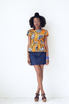 Jodi African Print Peplum Top - Yellow Fitted Orange Tops For Work, Chic Orange Short Sleeve Top, Fitted Cotton Blouse With Short Sleeves, Fitted Short Sleeve Top For Spring, Trendy Short Sleeve Stretch Blouse, Trendy Stretch Short Sleeve Blouse, Fitted Short Sleeve Top For Workwear, Orange Short Sleeve Blouse For Work, Orange Short-sleeve Blouse For Work