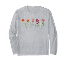 PRICES MAY VARY. Floral Elegance: Our vintage-inspired design features a stunning wildflowers print, making it perfect for those who adore nature and its beauty. Perfect Present: Looking for something who loves all things flower? Look no further! This graphic apparel is an ideal present for birthdays, holidays, or just to show someone you care. Lightweight, Classic fit, Double-needle sleeve and bottom hem Long Sleeve Floral Print T-shirt For Spring, Multicolor Long Sleeve Floral Print T-shirt, Long Sleeve Cotton T-shirt With Floral Print, Fall Floral Print T-shirt, Botanical Long Sleeve Tops With Plant Print, Long Sleeve T-shirt With Plants Print For Spring, Boho Wildflower, Graphic Apparel, Vintage Inspired Design