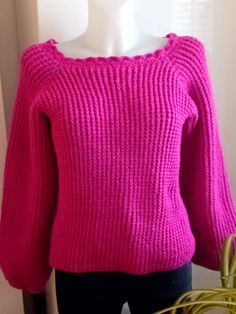 Crochet sweater is a perfect fuchsia pink colour off the shoulder top, with long sleeves. Look great with jeans trousers or skirt brighten up your autumn and winter months.  This sweater ready to ship in a Size:  Medium 12-14 UK            Medium  40-42 EU            Medium    8-10 US  Material:  100% Acrylic Care Instructions:  Machine Wash 40oC Hand Wash 40oC Pink Long Sleeve Knitting Pattern, Pink Knitted Long Sleeve Top, Pink Long Sleeve Knitted Top, Pink Hand Knitted Long Sleeve Sweater, Casual Pink Crochet Sweater, Winter Casual Pink Crochet Top, Pink Casual Crochet Top, Casual Pink Crochet Top For Winter, Pink Crochet Sweater For Winter