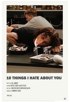 a man laying on top of a counter next to food