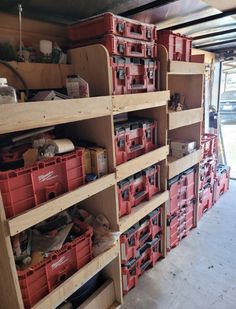 the shelves are filled with many different types of toolboxes and other storage containers