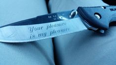 a pocket knife with a quote on it that says, your pleasure is my pleasure