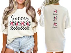 a woman wearing a white shirt with the word soccer mom printed on it and ripped shorts