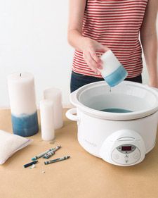 a woman is pouring something into a slow cooker with the lid open and it's contents scattered around