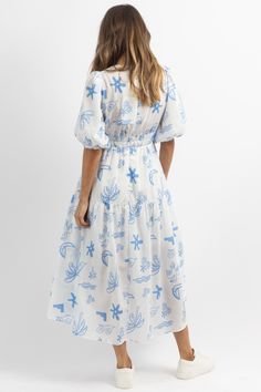 *SIGN UP FOR RESTOCK NOTIFICATIONS, ITEMS ARE RESTOCKED WHEN POSSIBLE BASED ON DEMAND* DESCRIPTION 65% Cotton, 35% Polyester V-neckline, Short sleeves, Flowy skirt, Patterned throughout, Elastic puff sleeves Naomie is wearing a size small Height | 5'8 Dress size | 2 Please note: All items purchased on sale are final sale. We recommend checking your cart for sale items to make note of non-returnable items. Tassel Dress, Denim Romper, Striped Jeans, Striped Maxi, Dropwaist Dress, Striped Maxi Dresses, Flowy Skirt, Drop Waist, Corset Top