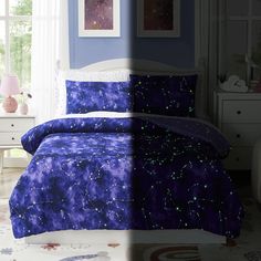 a bed with purple and blue comforters in a bedroom next to a white dresser