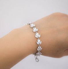 This lovely bracelet is rhodium plated and incrusted with cubic zirconia stones. It's very sparkling in person!The length of the bracelet is approximately 6.68" (16,4cm) with 1.5" extender (4 cm). ***All my designs are shipped from France. Please make sure you have enough time to get your purchase! Crystal Wedding Bracelet, Cubic Zirconia Bracelet, Bracelet Crystal, Zircon Jewelry, Jewelry Crystal, Bridal Bracelet, Crystal Wedding, Crystal Bracelet, Wedding Bracelet