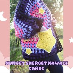 a woman wearing a crochet shawl with the words sunset sherbet kawaii cardi on it