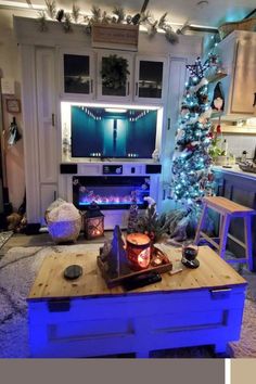 a living room filled with furniture and a christmas tree