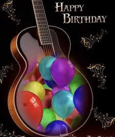 a guitar with balloons in it and the words happy birthday written on top of it