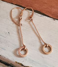 Simple bronze stick circle earrings