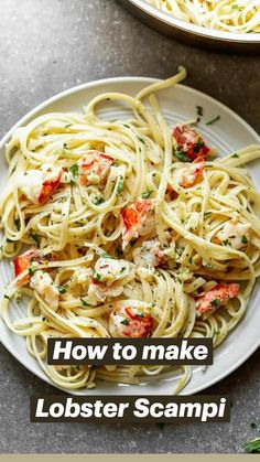 pasta with shrimp and parmesan cheese on a white plate next to another dish