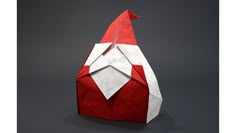 a red and white origami santa hat