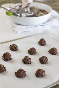 chocolate cookies on a cookie sheet ready to be baked