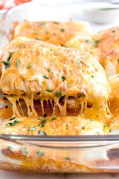 a casserole dish filled with meat and cheese