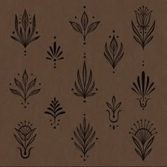 a brown paper with black designs on it