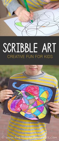 a young boy holding up a drawing with the words scribble art on it