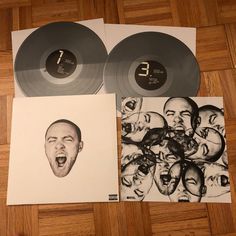 two black and white records with faces on them next to an image of a man's face