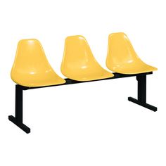 three yellow chairs sitting next to each other on top of a black stand up desk