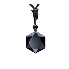 a black diamond on a string with a bead hanging from it's end