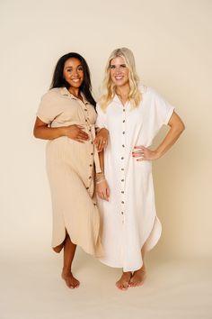 Shop All Colors: HERESizing: XS/S (2-6), M/L (6-10), XL/XXL (10-16) Modest Maternity Dress With Short Sleeves, Modest Short Sleeve Maternity Dress For Summer, Chic Maternity Midi Dress With Short Sleeves, Maternity Dresses With Short Sleeves, Casual White Maternity Midi Dress, Chic Maternity Midi Dress, Maternity Summer Dresses With Short Sleeves, Flowy Maternity Midi Dress, Neutral Cotton Dress For Daywear