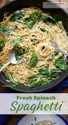 fresh spinach spaghetti in a skillet on a wooden table