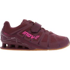 a women's shoe with pink lettering on the side