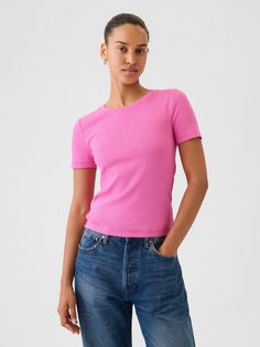 Supersoft modal-blend, slightly cropped T-shirt.  Crewneck.  Short sleeves.  * Fit: Stretch-to-Fit.  Slim & stretchy that forms to your shape.  Slightly cropped, hits at the waist.  Models wearing Gap Trendy Gap Short Sleeve T-shirt, Stretch Cropped T-shirt With Short Sleeves For Spring, Gap Stretch Seamless Tops, Gap Seamless Summer Tops, Spring Seamless Cropped T-shirt, Seamless Cropped T-shirt For Spring, Cropped Seamless T-shirt For Spring, Fitted Cropped Top By Gap, Seamless Cropped Summer T-shirt