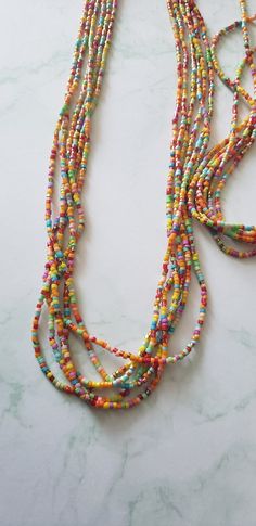 Lots of glorious beads in this multistand long necklace! It's over 30 inches long and has extension of 2 inches! We ship fast! Multi-strand Beaded Necklaces, Multi-strand Beaded Necklace With Large Beads, Multicolor Multi-strand Beaded Necklaces With Tiny Beads, Rainbow Multi-strand Beaded Necklaces, Multicolor Tiny Beads Multi-strand Necklace, Adjustable Multi-strand Beaded Necklaces, Colorful Multi-strand Beaded Necklaces, Adjustable Multicolor Multi-strand Beaded Necklace, Colorful Multi-strand Beaded Necklaces With Large Beads