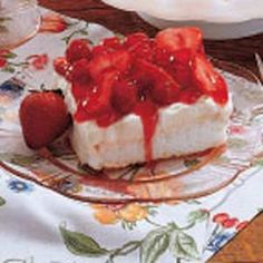 a piece of cheesecake with strawberries on top