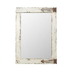 an old white frame mirror with rusted metal handles on the bottom and sides, against a white background