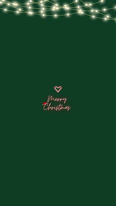 a green christmas card with string lights and a red heart on the bottom right corner