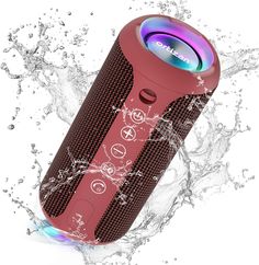 the bluetooth speaker is on top of water splashing around it's surface