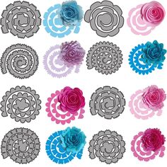 several different colored paper flowers are shown in this image, including one blue and one pink