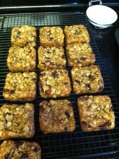 several squares of baked goods cooling on a rack