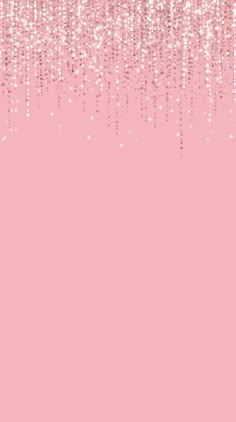 a pink background with lots of small white dots on the top and bottom of it