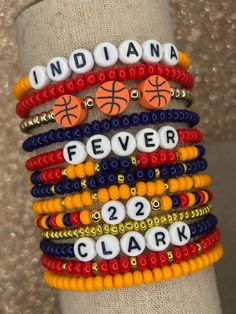 Perfect bracelets for the Indiana Fever or Caitlin Clark fan! We use high quality Czech glass beads to create these beautiful bracelets. Our basketball bracelet is composed of tarnish resistant 14k gold plated round beads that have been tried and true! We use a combination of sunflower yellow, navy blue and bright red beads that pull those perfect Indiana colors! Our bracelets are made to size. Need help with sizing? Simply follow the sizing chart located on our pictures. Needing a size other than listed? No problem! Message us before purchasing and we will help direct you to a more customized experience! Looking for more Indiana Fever/Caitlin Clark items? We sell nail stickers too! https://www.etsy.com/listing/1766654188/indiana-fever-nail-decals-fever-nail?click_key=ea566a5907b9bee4af4b7 Basketball Bracelet, Basketball Jewelry, Indiana Fever, Number 22, Caitlin Clark, Basketball Gifts, Sunflower Yellow, Spring Hill, March Madness